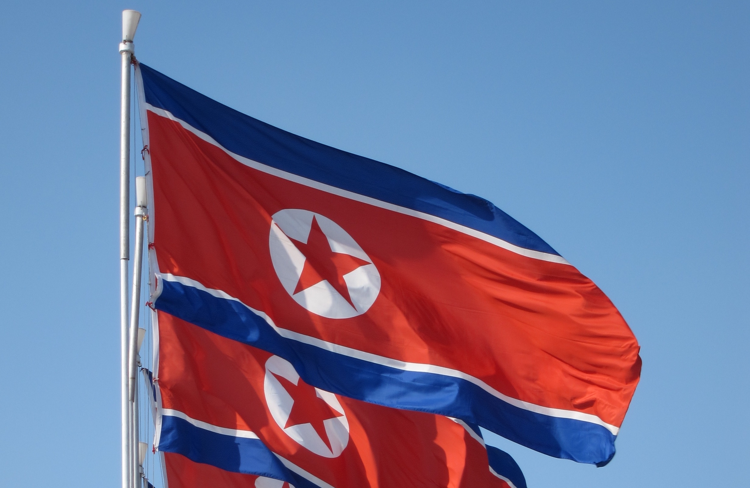 DPRK flag - photo credit Flickr photo by J. Pavelka/(cc by 2.0)