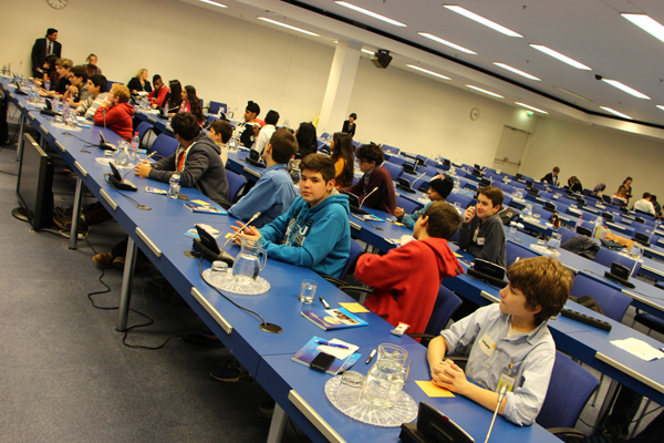 The younger students interviewing Programme Management Officers from the Department of Technical Cooperation