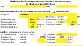Determination of absorbed dose to water in a high-energy photon-beam