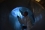 An IAEA safeguards inspector takes a close look inside one of the waste tanks at the radiochemical laboratory. All waste nuclear material at a radiochemical laboratory passes through these tanks. As a result, analysing samples taken from the waste tanks provide insight into the past operations of the laboratory.