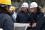 In January, an IAEA expert mission completed a review of the safety assessment process used at Japan's nuclear power plants. The picture shows team leader James Lyons (center) and IAEA safety specialist David Graves (right) discussing safety measures at the Ohi Nuclear Power Plant. 