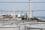 Water tanks holding contaminated water in front of the reactor buildings at Fukushima Daiichi.