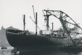 Leaving the Republic of Korea, the mobile laboratory was first hoisted onto a launch and then onto the deck of the USS President van Buren. March 1961. Please credit IAEA