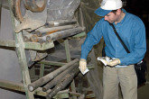 At a machine tool factory, an IAEA inspector takes smear samples. Photo Credits: Pavlicek/IAEA