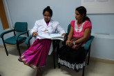 The doctor reviews the medical reports of 33 year-old Chalani Jayarathne, who has recovered from thyroid cancer after being given radioactive iodine. The Nuclear Medicine Unit treats over 200 patients a year for thyroid cancer. 